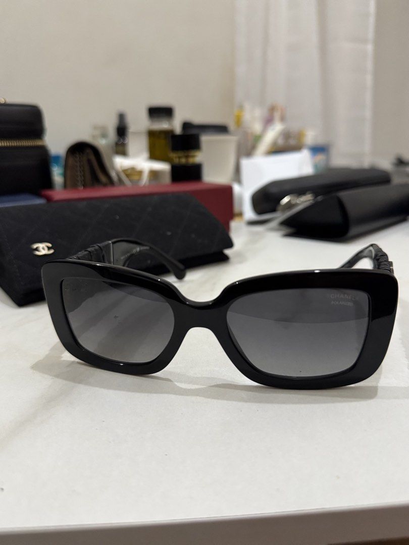Chanel Black Polarized Sunglasses with CC Logo (Category: Sunglasses & Eyewear) located in Caloocan City. Submitted by fastfire-6117 (Listing ID 1464243984, Image 1). Description: - Authentic Chanel sunglasses - Classic black frame - Gradient polarized lenses for comfort - Iconic CC logo detail on the side - Comes with original Chanel pouch - Ideal for sunny weather.