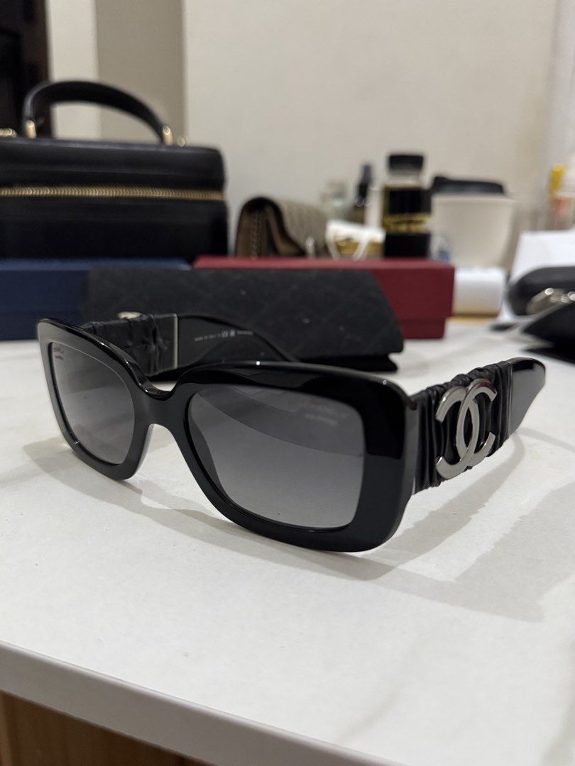 Chanel Black Polarized Sunglasses with CC Logo (Category: Sunglasses & Eyewear) located in Caloocan City. Submitted by fastfire-6117 (Listing ID 1464243984, Image 2). Description: - Authentic Chanel sunglasses - Classic black frame - Gradient polarized lenses for comfort - Iconic CC logo detail on the side - Comes with original Chanel pouch - Ideal for sunny weather.