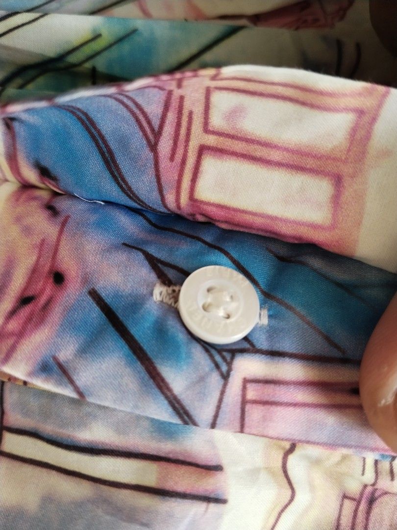 Chanel button down polo shirts (Category: Luxury Apparel) located in Barili. Submitted by francis88z (Listing ID 1464279559, Image 3). Description: Chanel button down polo shirts size 40 W21L25 as new condition no issue 1500+sf.