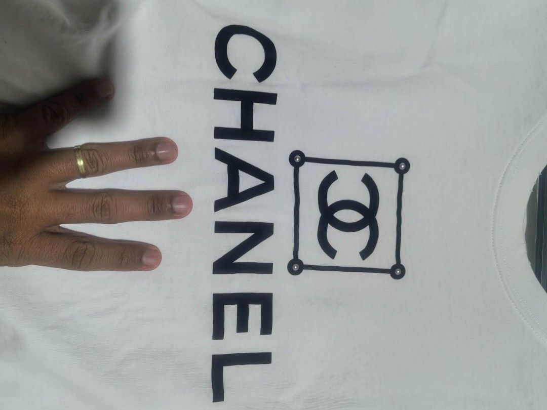 Chanel distress design shirt (Category: Tshirts & Polo Shirts ) located in Daet. Submitted by thriftnidiegz (Listing ID 1464271942, Image 3). Description: excellent condition no stain no issue no crack print L-27.5 W-22.