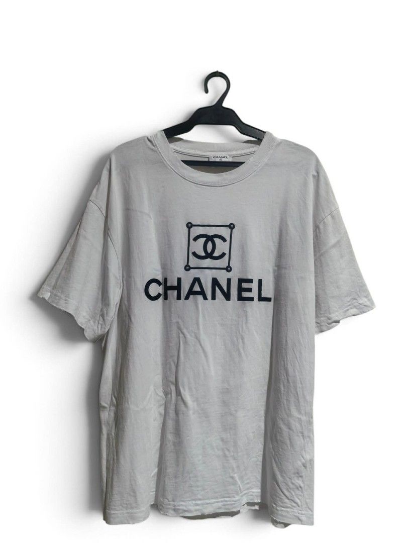 Chanel distress design shirt (Category: Tshirts & Polo Shirts ) located in Daet. Submitted by thriftnidiegz (Listing ID 1464271942, Image 1). Description: excellent condition no stain no issue no crack print L-27.5 W-22.