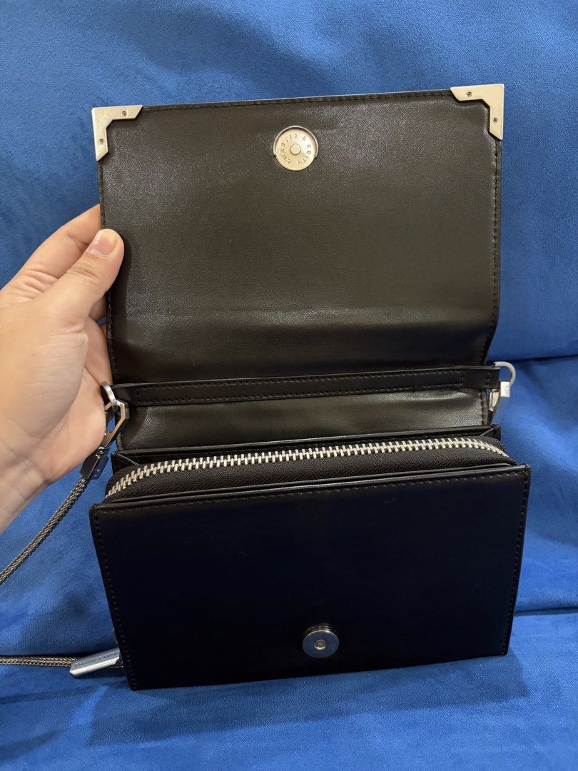 Charles & Keith Metallic Edge crossbody bag (Category: Cross-body Bags) located in Naga. Submitted by grand_trehh (Listing ID 1464172721, Image 3). Description: no issue pre loved bag .