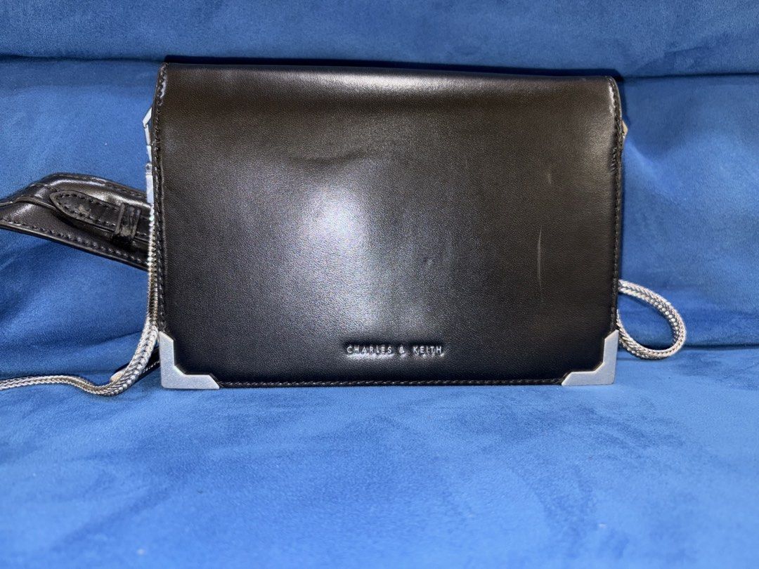 Charles & Keith Metallic Edge crossbody bag (Category: Cross-body Bags) located in Naga. Submitted by grand_trehh (Listing ID 1464172721, Image 2). Description: no issue pre loved bag .