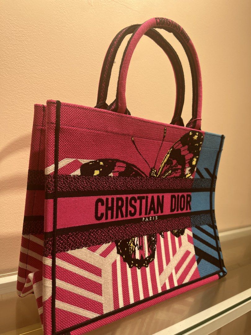 Christian Dior Book Tote (Category: Luxury Bags & Wallets) located in Manila. Submitted by luxuryitems_bybosst (Listing ID 1464223154, Image 1). Description: small-medium size excellent condition Japan source .