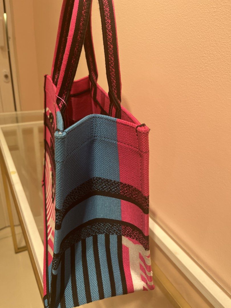 Christian Dior Book Tote (Category: Luxury Bags & Wallets) located in Manila. Submitted by luxuryitems_bybosst (Listing ID 1464223154, Image 3). Description: small-medium size excellent condition Japan source .