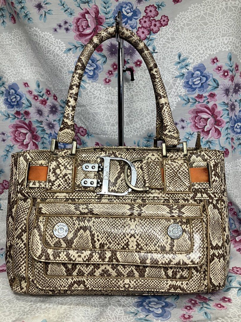 CHRISTIAN DIOR PYTHON FLIGHT LINE BAG (Category: Shoulder Bags) located in General Mariano Alvarez. Submitted by adonid (Listing ID 1464166632, Image 1). Description: CHRISTIAN DIOR PYTHON FLIGHT LINE BAG GOOD CONDITION NORMAL SIGN OF USAGE ONLY HAND / SHOULDER BAG.