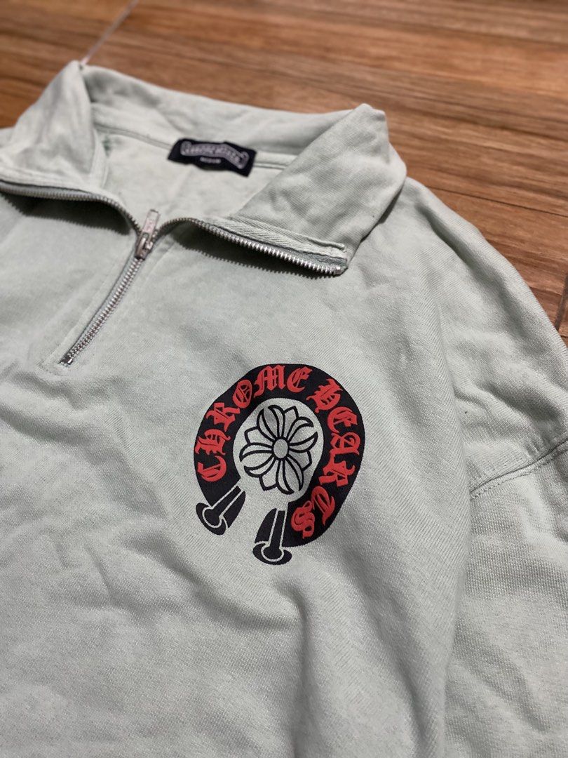 Chrome Hearts Quarter Zip Sweatshirt Medium (Category: Coats, Jackets and Outerwear) located in Baguio. Submitted by arenzu (Listing ID 1464302873, Image 3). Description: - Light green Chrome Hearts quarter zip sweatshirt - Iconic Chrome Hearts logo on front and back - Size: Medium - Made in Bangladesh - Ideal for casual wear.