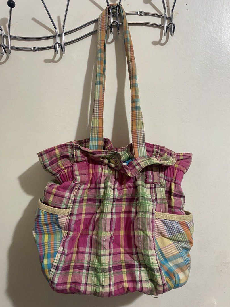 Claire’s Multicolor Tote Bag (Category: Tote Bags) located in Quezon City. Submitted by ie7zy (Listing ID 1464240547, Image 1). Description: - Brand: Claire's - Style: Multicolor plaid tote bag - Features: Roomy interior, side pockets - Condition: Good.