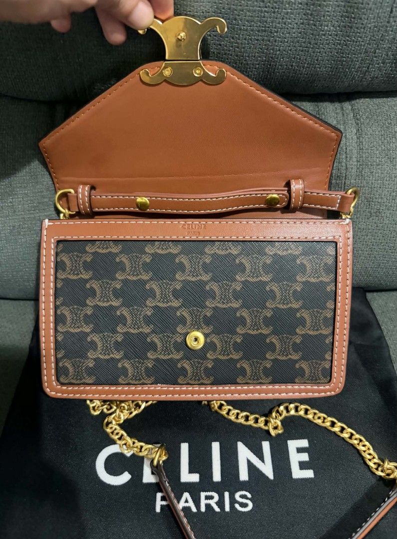 Classic Celine WOC (Category: Shoulder Bags) located in Quezon City. Submitted by luxxechic (Listing ID 1464163398, Image 3). Description: pure leather logo heat stamp with dust bag good as new no issue actual photo posted japan preloved mop: gcash .