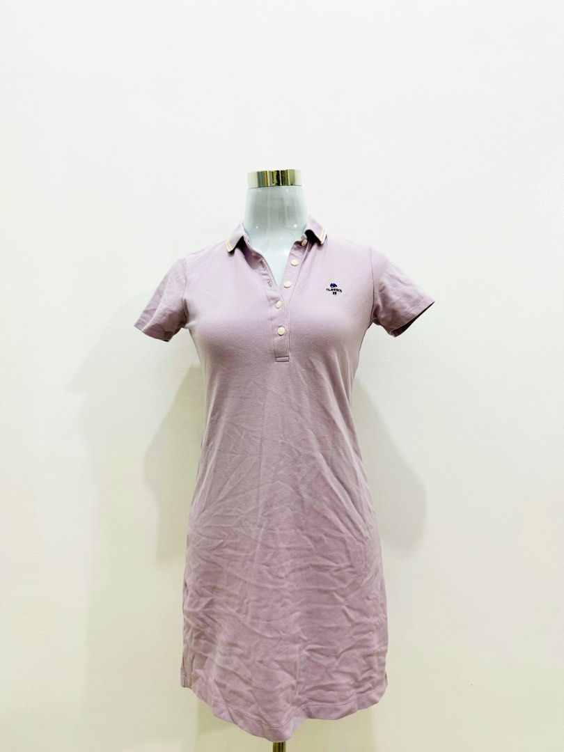Classics 44 Purple Polo Dress (Category: Dresses) located in Manila. Submitted by e.louise (Listing ID 1464333048, Image 2). Description: - Purple polo dress from Classics 44 - Short sleeves - Button-up neckline - Small embroidered logo on chest - Collar with subtle yellow and blue stripe detail - Ideal for casual outings.