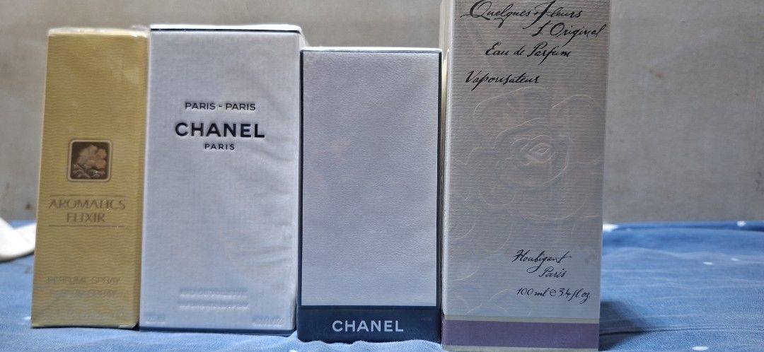 Clinique Aromatics Elixir, Chanel, Houbigant Paris Perfumes (Category: Luxury Accessories) located in Manila. Submitted by warmdog.994d4f (Listing ID 1464223765, Image 1). Description: - Set of 4 authentic designer perfumes. - Includes Clinique Aromatics Elixir Perfume Spray. - Features two Chanel Paris perfumes, one is a vaporisateur. - Also includes Houbigant Paris Eau de Parfum, 100ml. - All perfumes come in their original, unopened boxes..