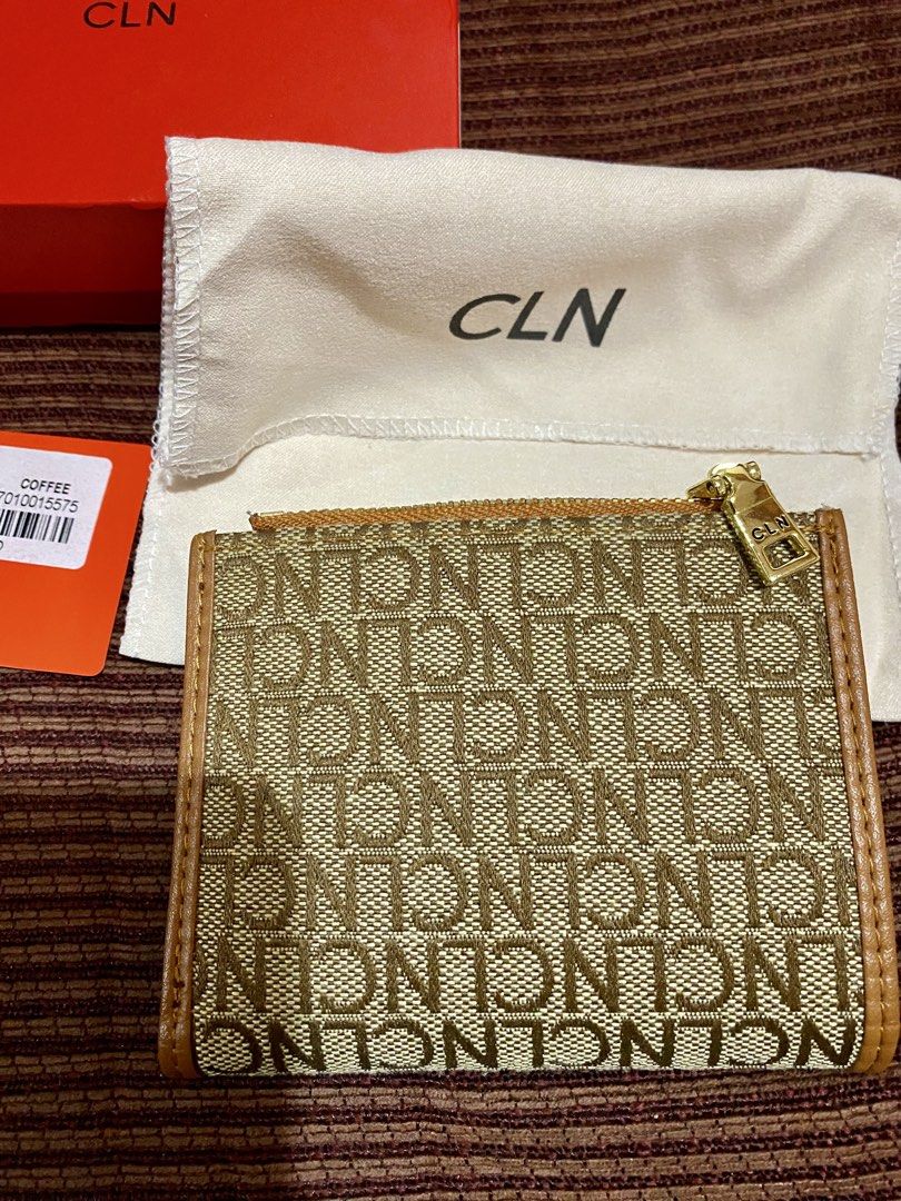 CLN 0224W - Rosé Wallet (Category: Wallets & Card holders) located in Manila. Submitted by kaiiila (Listing ID 1464212213, Image 2). Description: Only used for a week. Bi-fold medium wallet with pin-flap closure. 6 card slots + 1 coin slot with zip-around closure. Coffee woven. Buyer will shoulder the sf. .