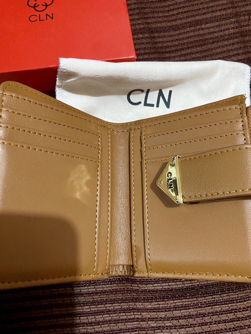 CLN 0224W - Rosé Wallet (Category: Wallets & Card holders) located in Manila. Submitted by kaiiila (Listing ID 1464212213, Image 3). Description: Only used for a week. Bi-fold medium wallet with pin-flap closure. 6 card slots + 1 coin slot with zip-around closure. Coffee woven. Buyer will shoulder the sf. .