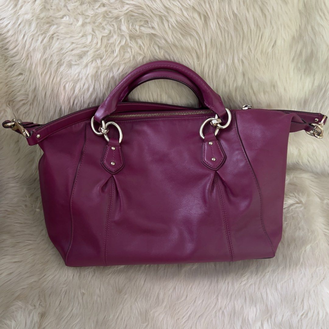 Coach Colette Smooth Leather Satchel Handbag (Category: Luxury Bags & Wallets) located in Mandaue City. Submitted by heeba_inu2 (Listing ID 1464168890, Image 3). Description: - Authentic purple Coach bag bought from USA - spacious and clean interior - slight handle discoloration (slide 7) Price can be negotiated! Please feel free to DM for more info 💕.