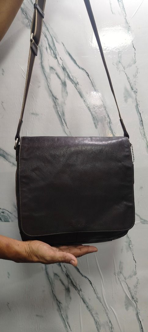 Coach Dark Brown Leather Messenger Bag (Category: Luxury Bags & Wallets) located in Caloocan City. Submitted by aliling30 (Listing ID 1464180806, Image 2). Description: - Coach messenger bag - Genuine dark brown leather - Spacious interior with multiple pockets - Adjustable strap for comfort - Ideal for daily use or travel - Shows some signs of wear, but in good overall condition.