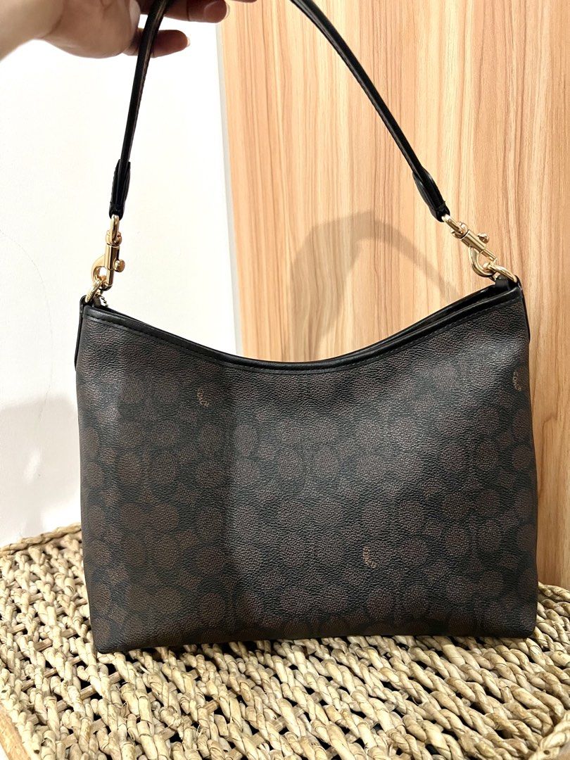 Coach Laurel Shoulder Bag (Category: Luxury Bags & Wallets) located in Cainta. Submitted by thedesignerpurse.mnl (Listing ID 1460892082, Image 3). Description: ➡️MAKE READING A HABIT PLEASE🙏🏻 ✅ like new condition used twice ko lang!! 💯authentic! money back if proven fake!! ! *color may vary depending on lightning 💯Legit Seller(pls check my reviews/rating) 🏡Loc: Cainta (lalamove/grab ready) 💵MOP: BPI BDO AND GCASH ONLY (WAG NA MAGHANAP NG IB
