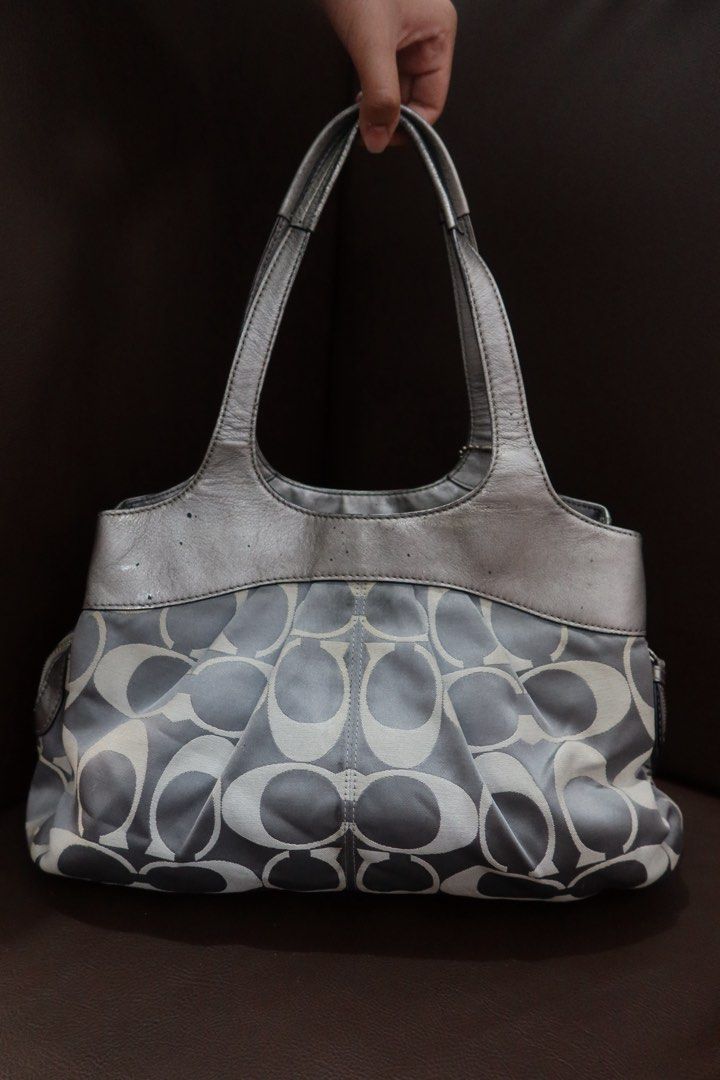 Coach Lexi Blue Silver (Category: Shoulder Bags) located in Manila. Submitted by dragonflyvintage_ (Listing ID 1464189419, Image 2). Description: 𝐂𝐂𝐇 𝐋𝐄𝐗𝐈 𝐒𝐈𝐋𝐕𝐄𝐑 𝐁𝐋𝐔𝐄 Silver Blue Canvas + Metallic Leather 👜 TO CLAIM: Comment MINE or RESERVE. * MINE — ₱3,999 *full payment in 24hrs * RESERVE — ₱4,099 *₱500 deposit + balance within 3 days ☑️ CONDITION B — Good Vintage Condition * few stains & scratches * minimal interior signs of u