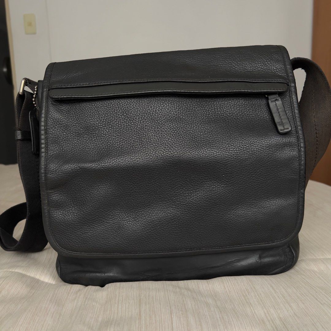 Coach Men’s Camden Leather Messenger Bag (Category: Luxury Bags & Wallets) located in Pasig City. Submitted by jenscloset86 (Listing ID 1464298568, Image 3). Description: COACH Men’s Camden Leather Crossbody Bag • Pebbled cowhide leather • No inclusion. • With visible wear and tear (see photos for reference) • A part of the fabric strap is fraying and has some discoloration. • Leather cracking at the bottom part (front) and in 1 anchor holding th