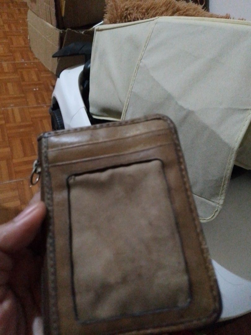 Coach Monogram Canvas Card Holder with Zipper (Category: Luxury Bags & Wallets) located in Manila. Submitted by russelsimo37305 (Listing ID 1464240245, Image 2). Description: - Authentic Coach card holder - Classic monogram pattern - Zippered compartment for coins/cash - Multiple card slots - Genuine leather trim - Perfect for everyday essentials.