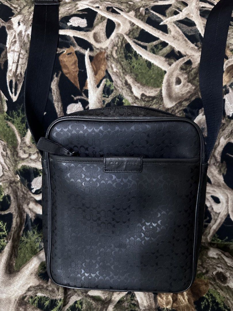 Coach Monogram Crossbody Bag Black (Category: Luxury Bags & Wallets) located in Manila. Submitted by shopaholic_gurl (Listing ID 1464203800, Image 2). Description: - Authentic Coach crossbody bag - All-over Coach monogram pattern - Adjustable strap with silver hardware - Front slip pocket - Zip top closure - Ideal for everyday use - this is preloved item pls manage expectations.