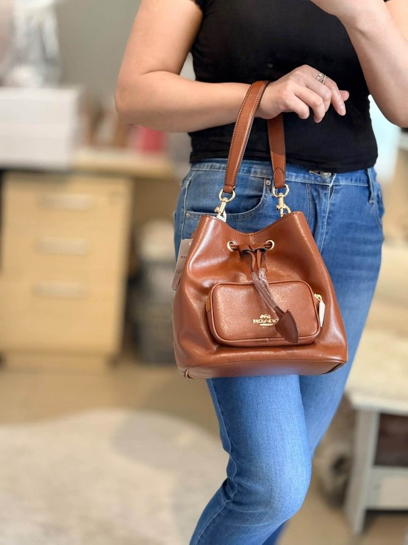 Coach Rowan Bucket Pocket (Category: Shoulder Bags) located in Quezon City. Submitted by bagsboutiqueph (Listing ID 1464189500, Image 3). Description: LAST PRICE POSTED. LIMITED STOCKS! BRANDNEW WITH INCLUSIONS. COLOR MAY SLIGHTLY VARY IN ACTUAL DUE TO LIGHTING AND CAMERA SETTING. OTHER PHOTOS WILL BE SEND DURING PURCHASE AND FOR SURE BUYERS ONLY. WHEN IN DOUBT, DO NOT ORDER. THANK YOU..