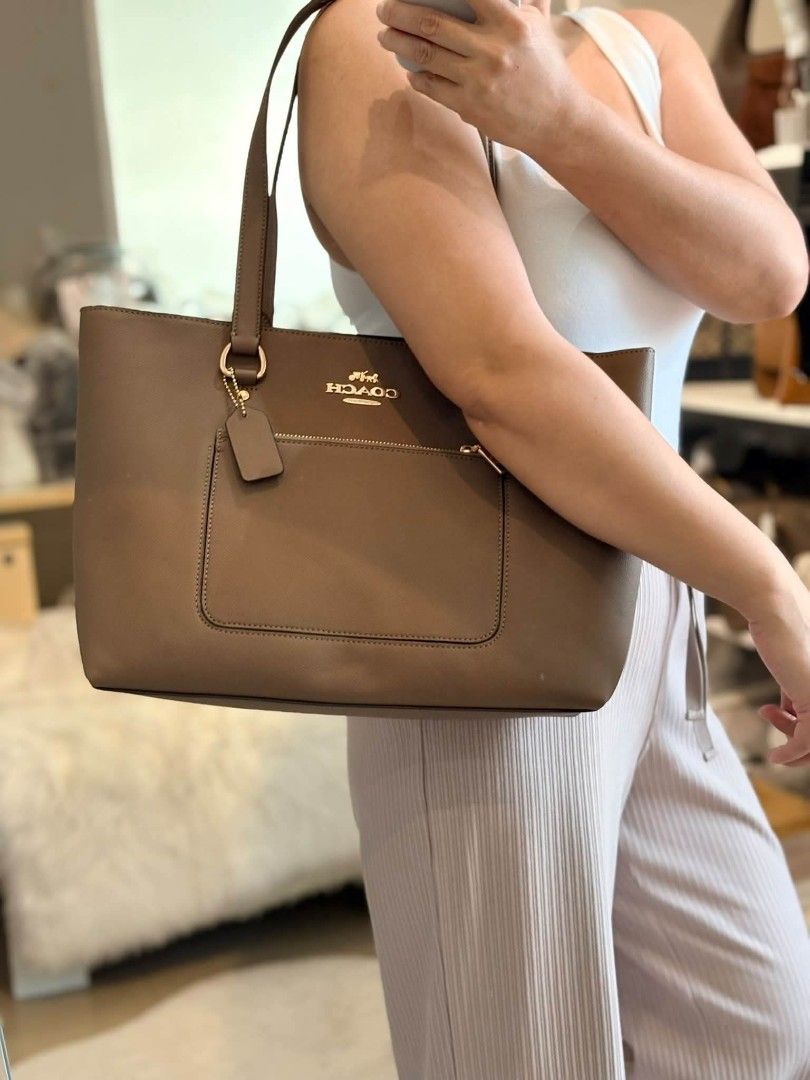 Coach Station Tote in Taupe (Category: Tote Bags) located in Quezon City. Submitted by bagsboutiqueph (Listing ID 1464189943, Image 3). Description: LAST PRICE POSTED. LIMITED STOCKS! BRANDNEW WITH INCLUSIONS. COLOR MAY SLIGHTLY VARY IN ACTUAL DUE TO LIGHTING AND CAMERA SETTING. OTHER PHOTOS WILL BE SEND DURING PURCHASE AND FOR SURE BUYERS ONLY. WHEN IN DOUBT, DO NOT ORDER. THANK YOU..