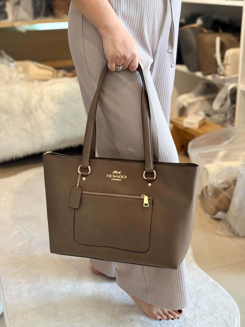 Coach Station Tote in Taupe (Category: Tote Bags) located in Quezon City. Submitted by bagsboutiqueph (Listing ID 1464189943, Image 2). Description: LAST PRICE POSTED. LIMITED STOCKS! BRANDNEW WITH INCLUSIONS. COLOR MAY SLIGHTLY VARY IN ACTUAL DUE TO LIGHTING AND CAMERA SETTING. OTHER PHOTOS WILL BE SEND DURING PURCHASE AND FOR SURE BUYERS ONLY. WHEN IN DOUBT, DO NOT ORDER. THANK YOU..