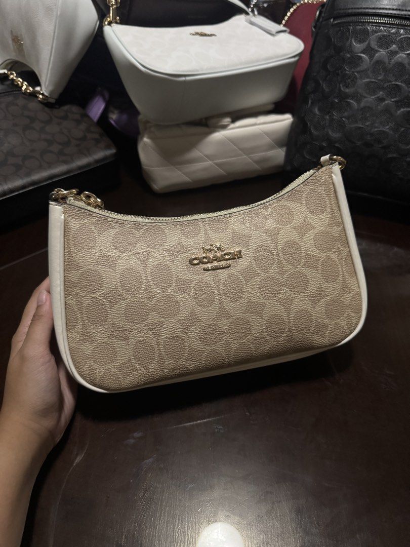 Coach Teri Shoulder Bag Classic (Category: Shoulder Bags) located in Manila. Submitted by ohmymyles (Listing ID 1464232754, Image 3). Description: Teri Classic - not auth, viet copy - with 2 straps.