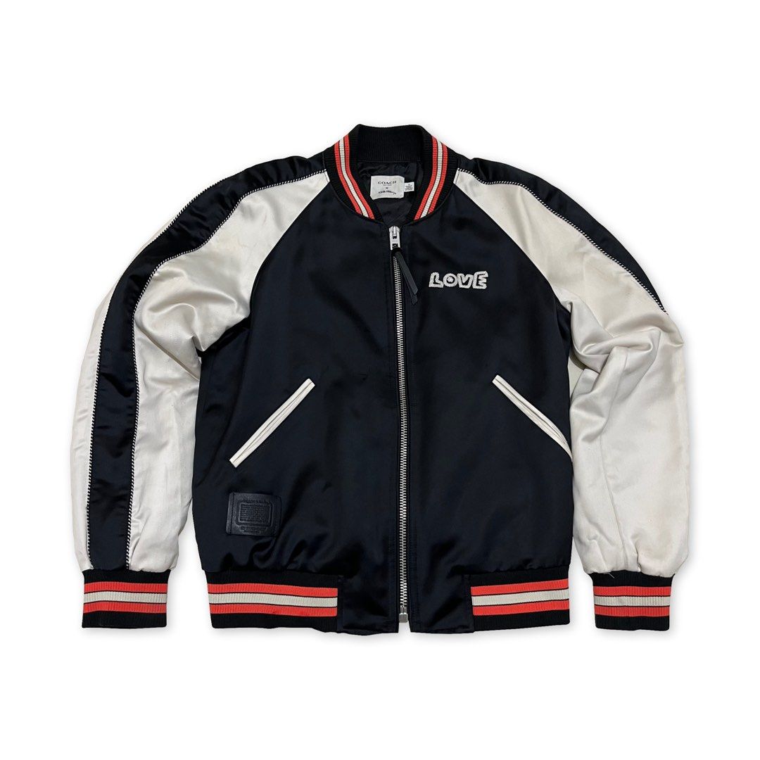 Coach x Keith Haring, Love Liberty Bomber Jacket (Category: Luxury Apparel) located in Manila. Submitted by s0leilrouge (Listing ID 1464264929, Image 1). Description: Authentic Coach X Keith Haring, Love Liberty Bomber Jacket Size S W 19 L 23 Issue - Small Fraying barely noticeable ( see second to last slide ) 2000 + SF.