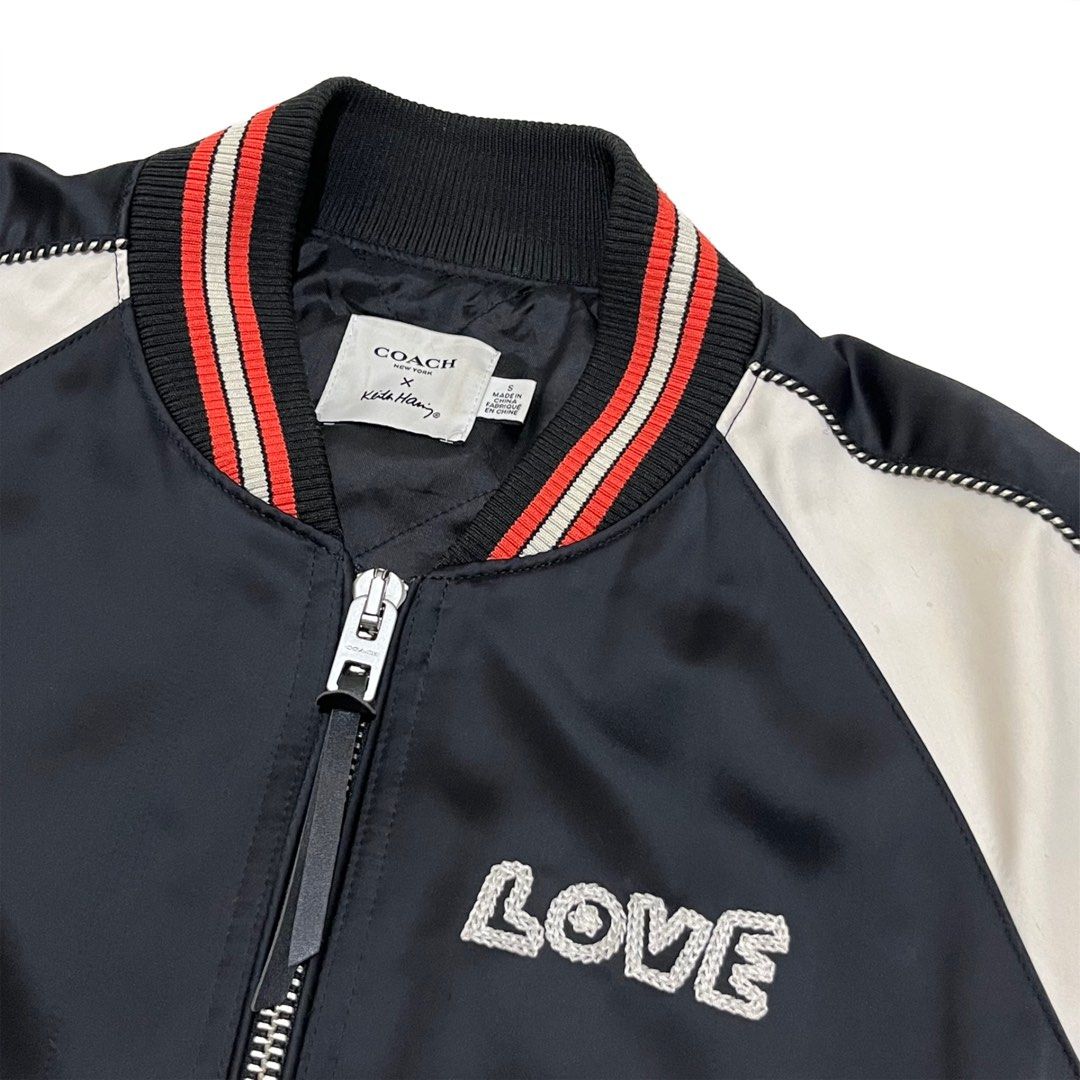 Coach x Keith Haring, Love Liberty Bomber Jacket (Category: Luxury Apparel) located in Manila. Submitted by s0leilrouge (Listing ID 1464264929, Image 3). Description: Authentic Coach X Keith Haring, Love Liberty Bomber Jacket Size S W 19 L 23 Issue - Small Fraying barely noticeable ( see second to last slide ) 2000 + SF.