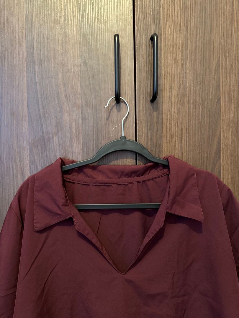 Collared V-Neck Top | Maroon | Fits up to XL (Category: Shirts) located in Makati City. Submitted by autumn.latte (Listing ID 1464250010, Image 3). Description: ♡ Relaxed fit—perfect for running errands - Color: Maroon - Collared V-neck design - Short sleeves - Relaxed fit - RFS: Too many maroon/burgundy tops 🌷 Pre-loved. Please see photos for actual condition. 🛍️ MOP: BPI / GCash / MariBank only 🛵 Shipping shouldered by buyer via Grab / Lalam