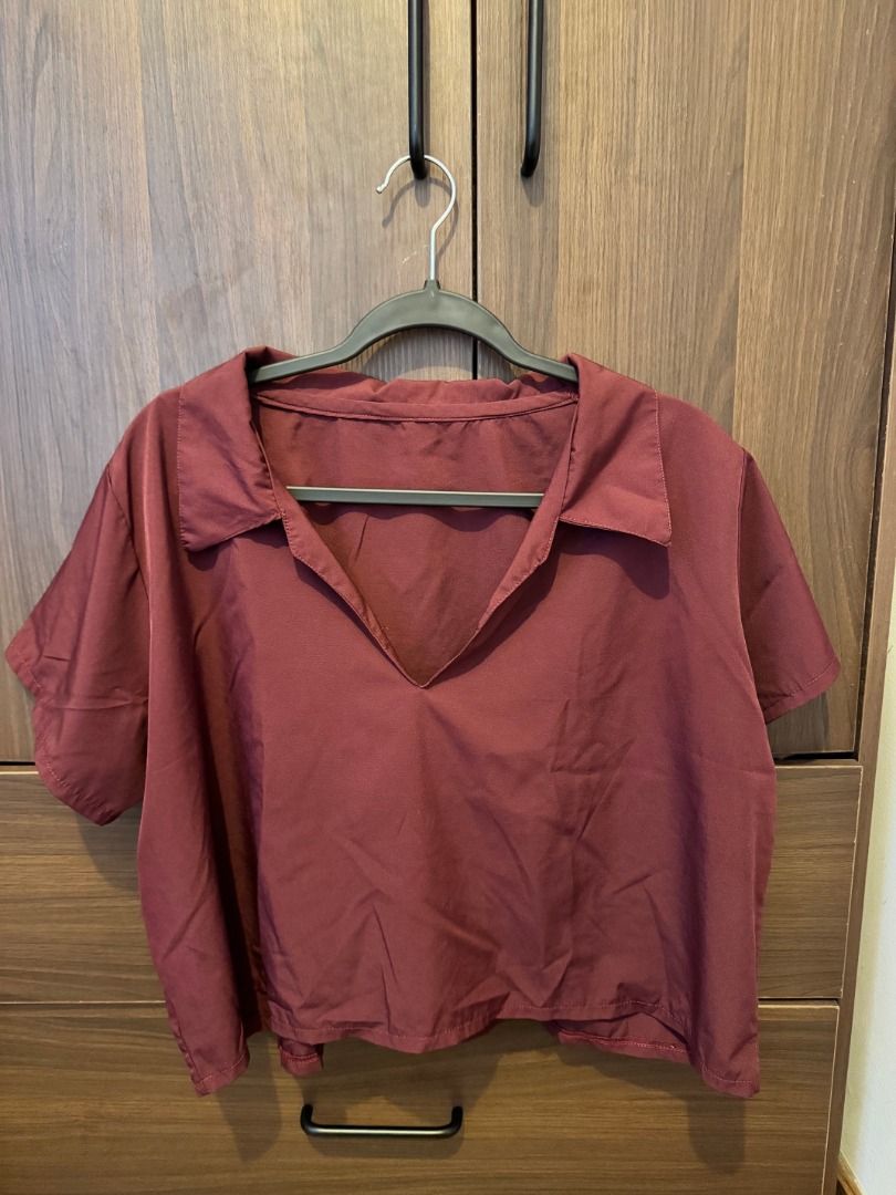 Collared V-Neck Top | Maroon | Fits up to XL (Category: Shirts) located in Makati City. Submitted by autumn.latte (Listing ID 1464250010, Image 1). Description: ♡ Relaxed fit—perfect for running errands - Color: Maroon - Collared V-neck design - Short sleeves - Relaxed fit - RFS: Too many maroon/burgundy tops 🌷 Pre-loved. Please see photos for actual condition. 🛍️ MOP: BPI / GCash / MariBank only 🛵 Shipping shouldered by buyer via Grab / Lalam