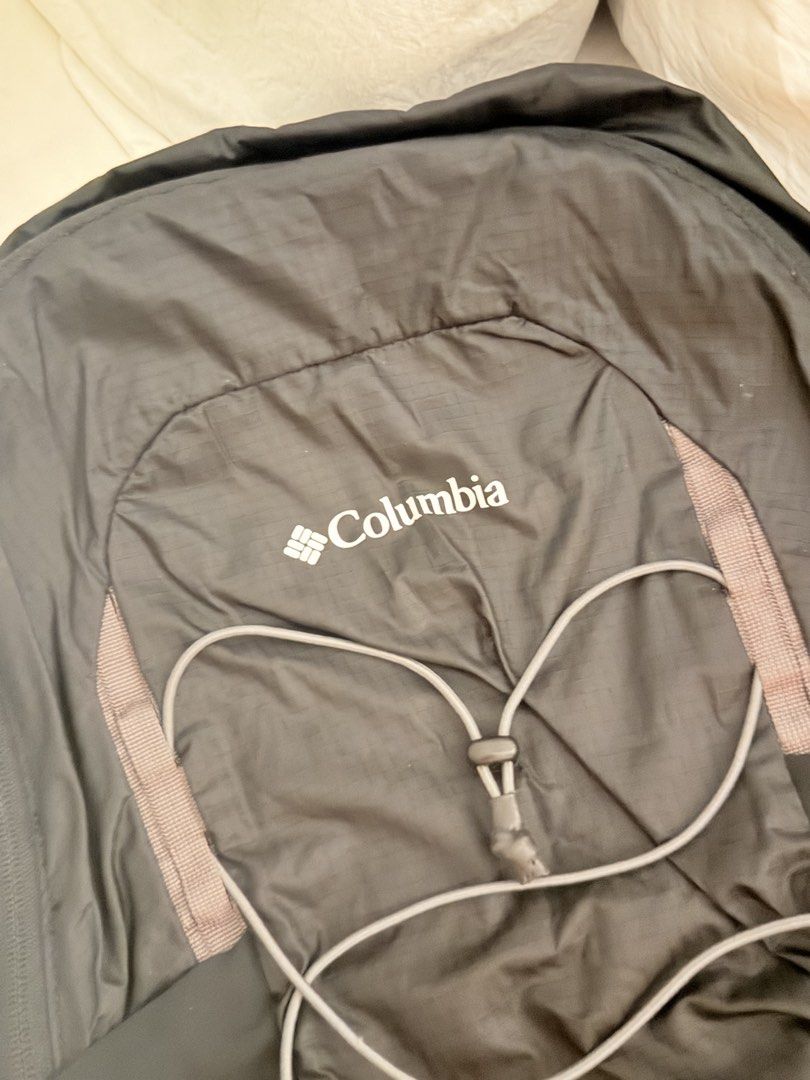 Columbia Black Lightweight Foldable Backpack (Category: Backpacks) located in Manila. Submitted by mengxir20193848 (Listing ID 1464192458, Image 2). Description: - Columbia backpack in black - Lightweight and foldable design - Ideal for travel or everyday use - Adjustable straps for a comfortable fit - Multiple pockets for easy organization - Zippers are in excellent working condition - Ready for your next adventure!.