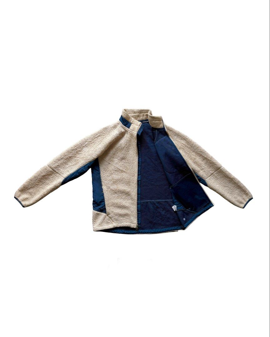 Columbia Two Tone Sherpa-Lined Jacket (Category: Coats, Jackets and Outerwear) located in Manila. Submitted by morf_sply (Listing ID 1464290112, Image 2). Description: Relaxed fit fleece with stand collar and lightly padded lining. Contrast two tones with chest pocket. Long sleeves with hip pockets. Zip up front. L on tag. Shoulder Width 18 in Pit to Pit 22 in Length 25.5 in Sleeves 24 in.