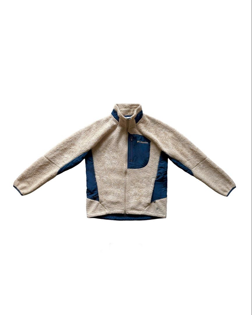 Columbia Two Tone Sherpa-Lined Jacket (Category: Coats, Jackets and Outerwear) located in Manila. Submitted by morf_sply (Listing ID 1464290112, Image 1). Description: Relaxed fit fleece with stand collar and lightly padded lining. Contrast two tones with chest pocket. Long sleeves with hip pockets. Zip up front. L on tag. Shoulder Width 18 in Pit to Pit 22 in Length 25.5 in Sleeves 24 in.