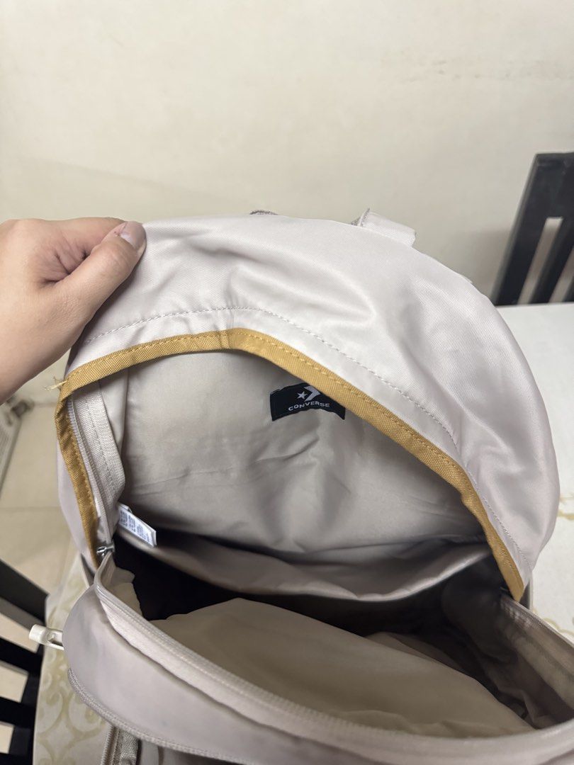 Converse Chuck Taylor Backpack (Category: Backpacks) located in Manila. Submitted by jaa_23 (Listing ID 1464175943, Image 2). Description: - Beige color - Has 6 pockets — 4 are with zipper - Padded on the back side as well as on the straps - Perfect for school or everyday use.
