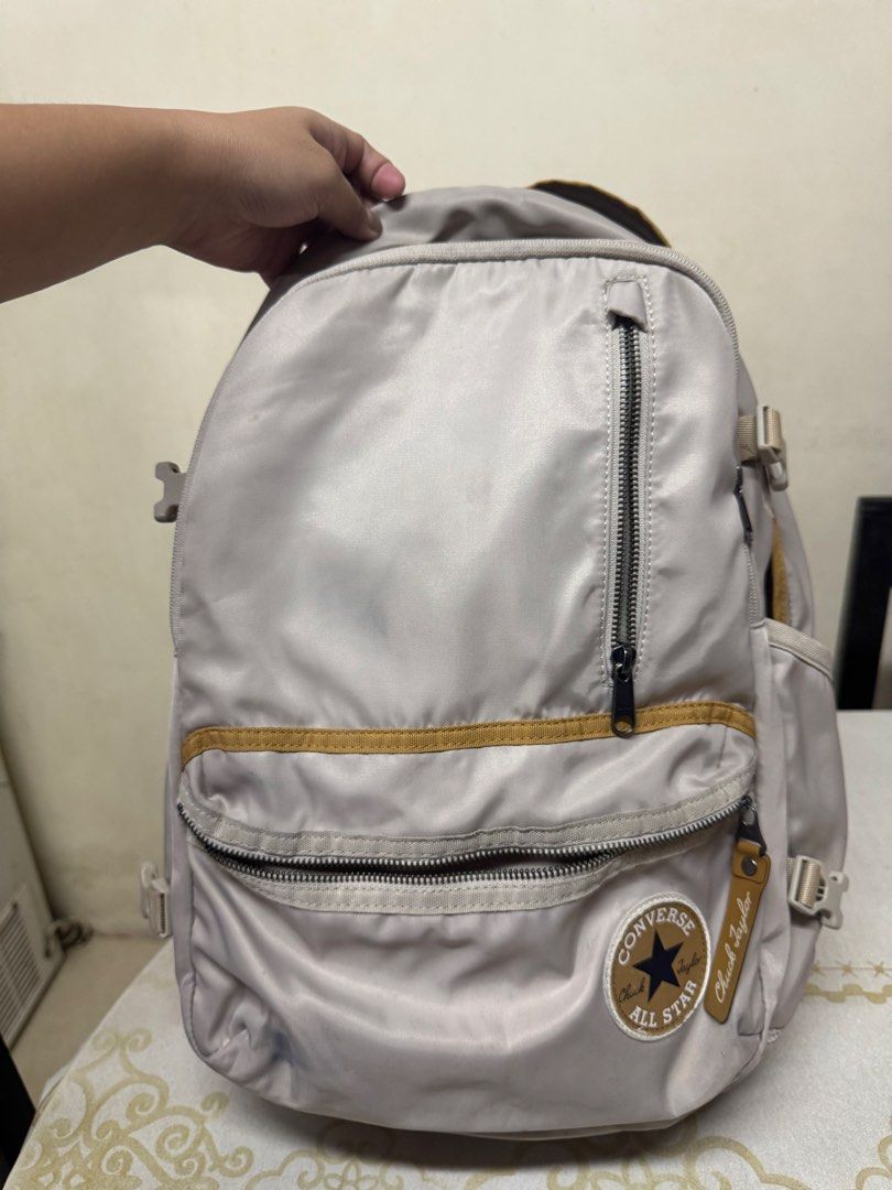 Converse Chuck Taylor Backpack (Category: Backpacks) located in Manila. Submitted by jaa_23 (Listing ID 1464175943, Image 1). Description: - Beige color - Has 6 pockets — 4 are with zipper - Padded on the back side as well as on the straps - Perfect for school or everyday use.