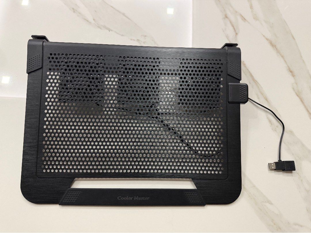 Cooler Master Laptop Cooling Pad with 3 Fans (Category: Laptops & Notebooks) located in Makati City. Submitted by monkeykingo (Listing ID 1464172261, Image 3). Description: - Cooler Master laptop cooling pad - Features 3 built-in fans for excellent airflow - USB powered for convenience - Adjustable stand for optimal viewing angles - Keeps your laptop cool during extended use - In great working condition.