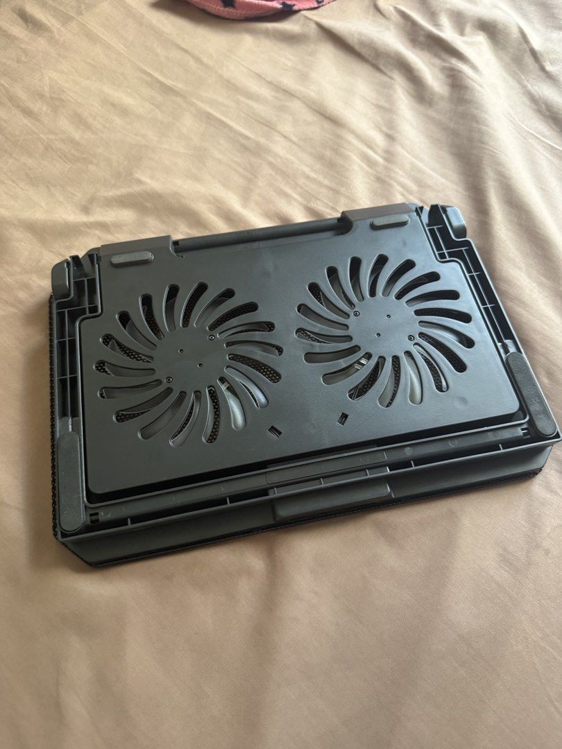 Cooler Master Laptop Cooling Pad with USB Ports (Category: Laptops & Notebooks) located in Valenzuela. Submitted by gwntrn (Listing ID 1464182314, Image 2). Description: - Cooler Master Laptop Cooling Pad - Dual built-in fans for optimal cooling - 2 additional USB ports for connectivity - Mesh surface ensures excellent airflow - Adjustable stand for ergonomic viewing angles - Ideal for gaming and extended work sessions.