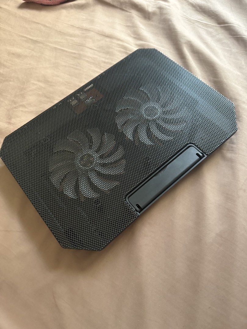 Cooler Master Laptop Cooling Pad with USB Ports (Category: Laptops & Notebooks) located in Valenzuela. Submitted by gwntrn (Listing ID 1464182314, Image 3). Description: - Cooler Master Laptop Cooling Pad - Dual built-in fans for optimal cooling - 2 additional USB ports for connectivity - Mesh surface ensures excellent airflow - Adjustable stand for ergonomic viewing angles - Ideal for gaming and extended work sessions.