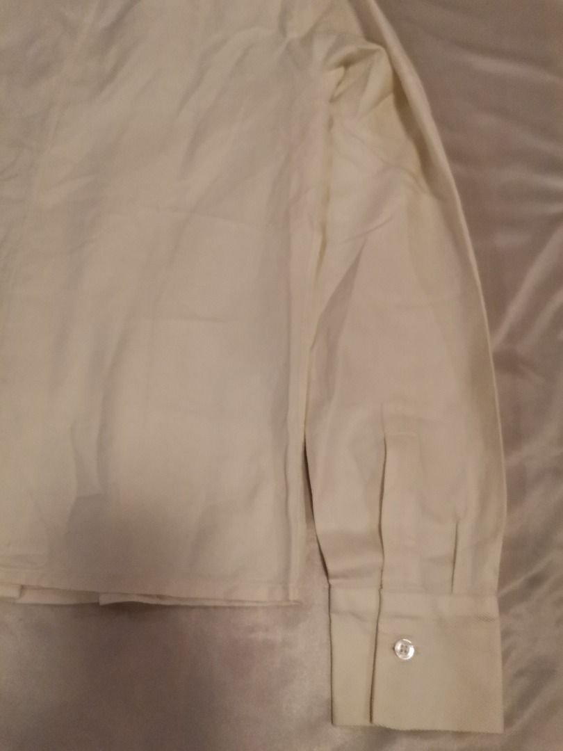 Cream Long Sleeve Button Up Shirt (Category: Longsleeves) located in Cebu City. Submitted by queensco (Listing ID 1464288171, Image 2). Description: - Cream colored long sleeve shirt - Classic and simple design - Versatile for work or casual wear - Features button cuffs - Minor faint marks on the front, please check photos for details.