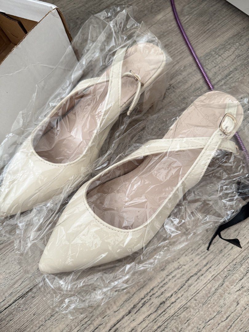 Cream White Bridal Heels (Category: Heels) located in Bulacan. Submitted by itsmsks (Listing ID 1464158558, Image 2). Description: - Cream slingback heels - Pointed toe design - Adjustable buckle strap at the heel - free Detachable rhinestone embellishment for extra sparkle - Ideal for elevating any outfit - Sold as a pair -free sole foam .