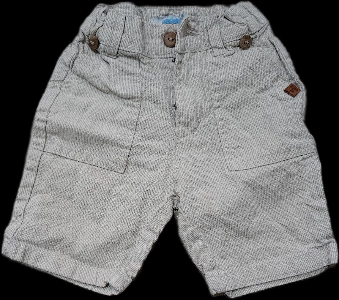 Crib Couture Cargo Shorts (18-24 months) (Category: Babies & Kids Fashion) located in Makati City. Submitted by xzyche (Listing ID 1464141148, Image 1). Description: - Light beige cargo shorts for boys - Comfortable elastic waistband with button closure - Two front pockets - Two back pockets with secure button flaps - Textured fabric for a stylish look - Ideal for everyday casual wear and outdoor adventures.