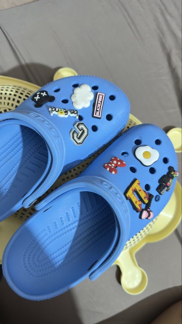 Crocs Classic Clogs (Category: Flats & Sandals) located in Manila. Submitted by kirayychii (Listing ID 1464226865, Image 2). Description: - Crocs Original Clogs - Authentic - Jibbitz are free - Used less than 5 times - Not abused and only needs cleaning - RFS: Wrong size.