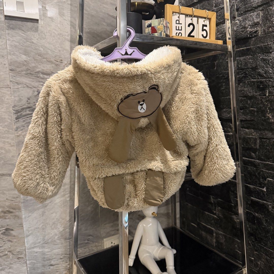 Cute Bear Fleece Jacket for Kids (Category: Babies & Kids Fashion) located in Manila. Submitted by iceonmyneck (Listing ID 1464204038, Image 2). Description: - Super soft and cozy fleece jacket for kids - Adorable bear design with ears on the back - Easy zipper closure - in perfection condition - Keeps your child warm and stylish - Great for everyday wear or special occasions.