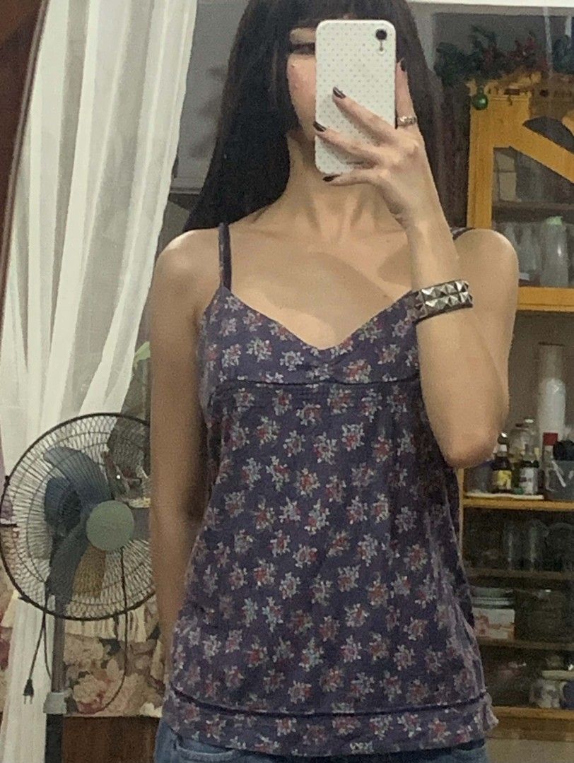 Dark Floral Cami Top with Thin Straps (Category: Sleeveless) located in Tiaong. Submitted by cdoswan (Listing ID 1464273209, Image 2). Description: - Cute dark floral print cami top - Features thin adjustable straps - Sweetheart neckline - Delicate lace trim along the hem - Lightweight and flowy material - Perfect for layering or wearing solo.