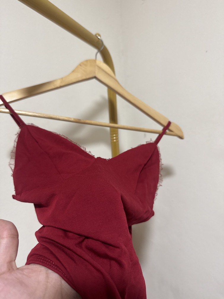 Dark Red Sleeveless Bodysuit (Category: Others Tops) located in Mexico. Submitted by studioleraph (Listing ID 1464238825, Image 3). Description: 🛍️ Perfect for your personal wardrobe 🫶 👗 The actual item being sold is the original garment shown in the product photos. Small differences in fit, drape, color, texture, or details may occur. 💌 Condition: • Preloved; Please wash the items before wearing. • Please manage expectations as these are vin