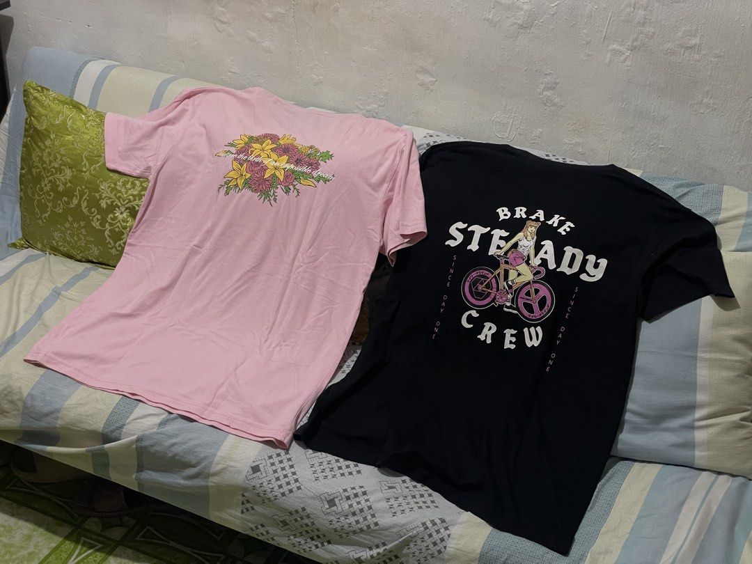 DBTK & Brake Steady Crew T-shirts (Category: Tshirts & Polo Shirts ) located in Makati City. Submitted by christian_g (Listing ID 1464250321, Image 2). Description: - Pink DBTK tee with a stylish floral graphic. - Black Brake Steady Crew tee featuring a cool cyclist graphic. - Both tees are made for comfort and style. - Ideal for everyday casual wear. - Don't miss out on these awesome graphic tees!.