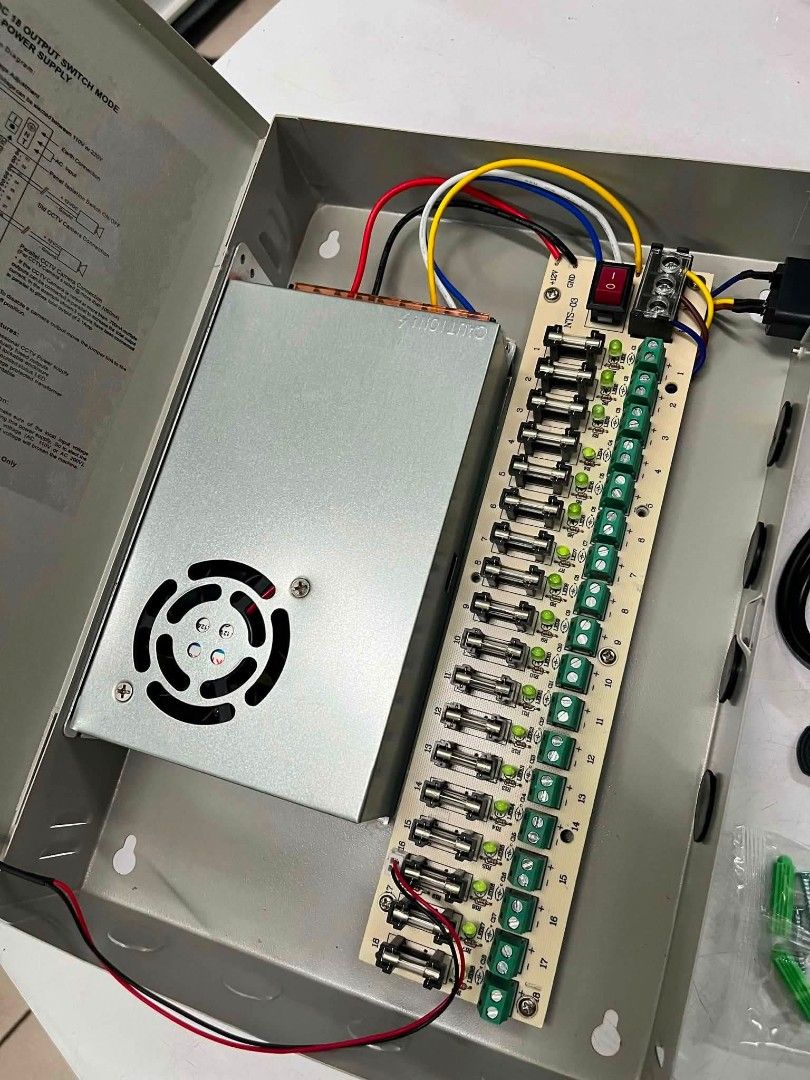 DC 12V CCTV Power Distribution Box with 18 Outputs (Category: Electrical, Adaptors & Sockets) located in Manila. Submitted by gentleflower_d35c5f (Listing ID 1464185392, Image 2). Description: - 18 fused outputs for 12V DC devices - Ideal for CCTV cameras and similar equipment - Includes lock and keys for security - Simplifies power management and organization - Ready to use.