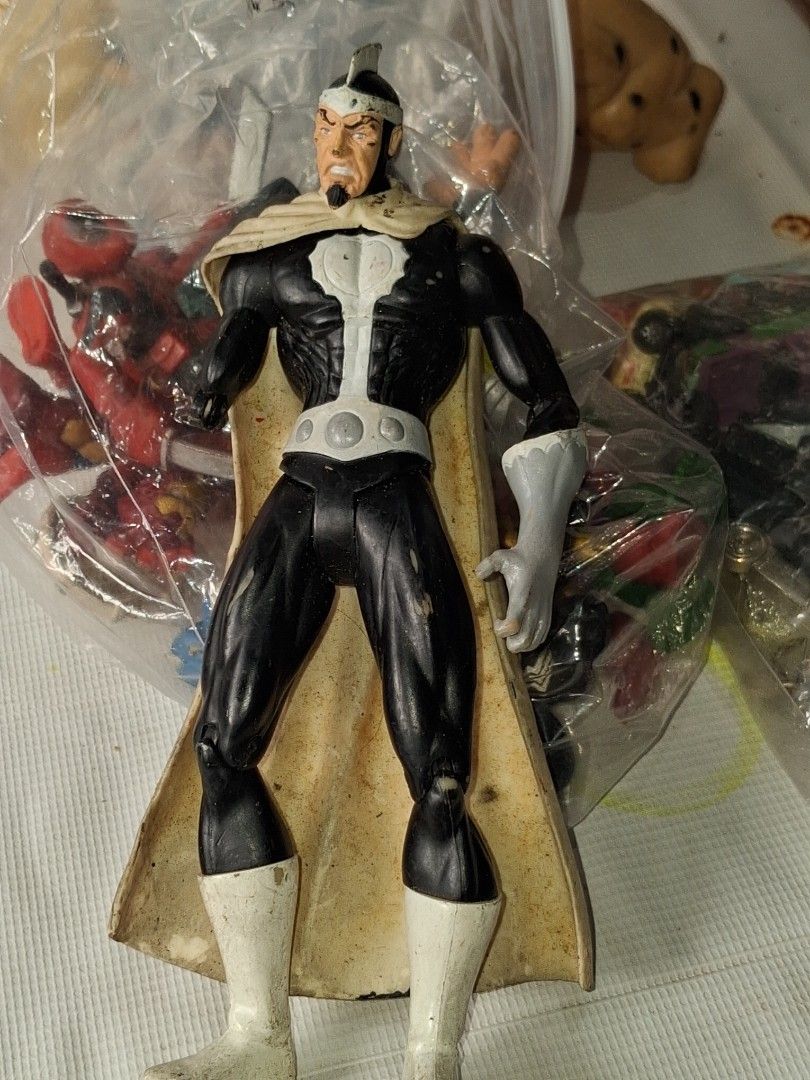 DC Comics Action Figure - Black Suit with Cape (Category: Figurines & Statues) located in Manila. Submitted by marcas022798212 (Listing ID 1464147548, Image 2). Description: - DC Comics action figure - Black suit with white accents - Cream-colored cape - Ideal for collectors.